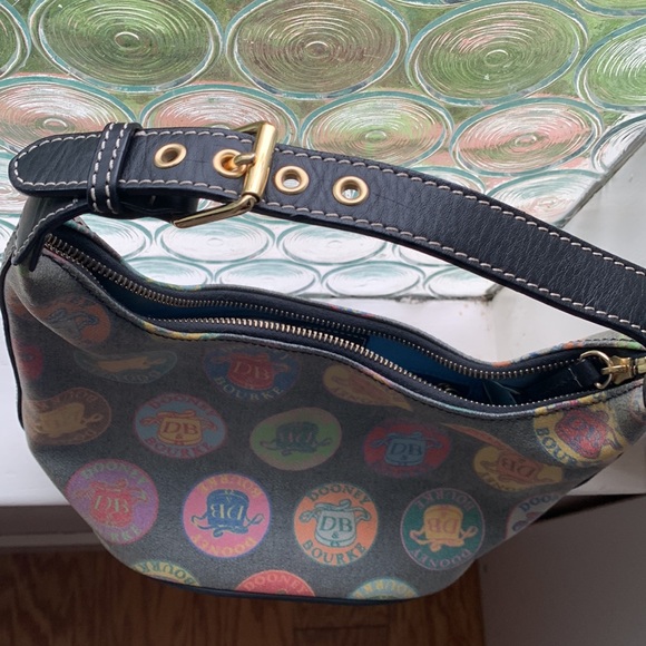 Authentic Dooney and Bourke wax coated handbag with adjustable leather strap - Picture 14 of 16